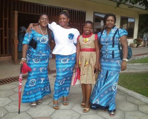 Four friends in matching blue