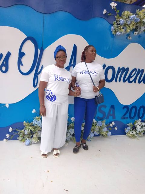 By the event backdrop